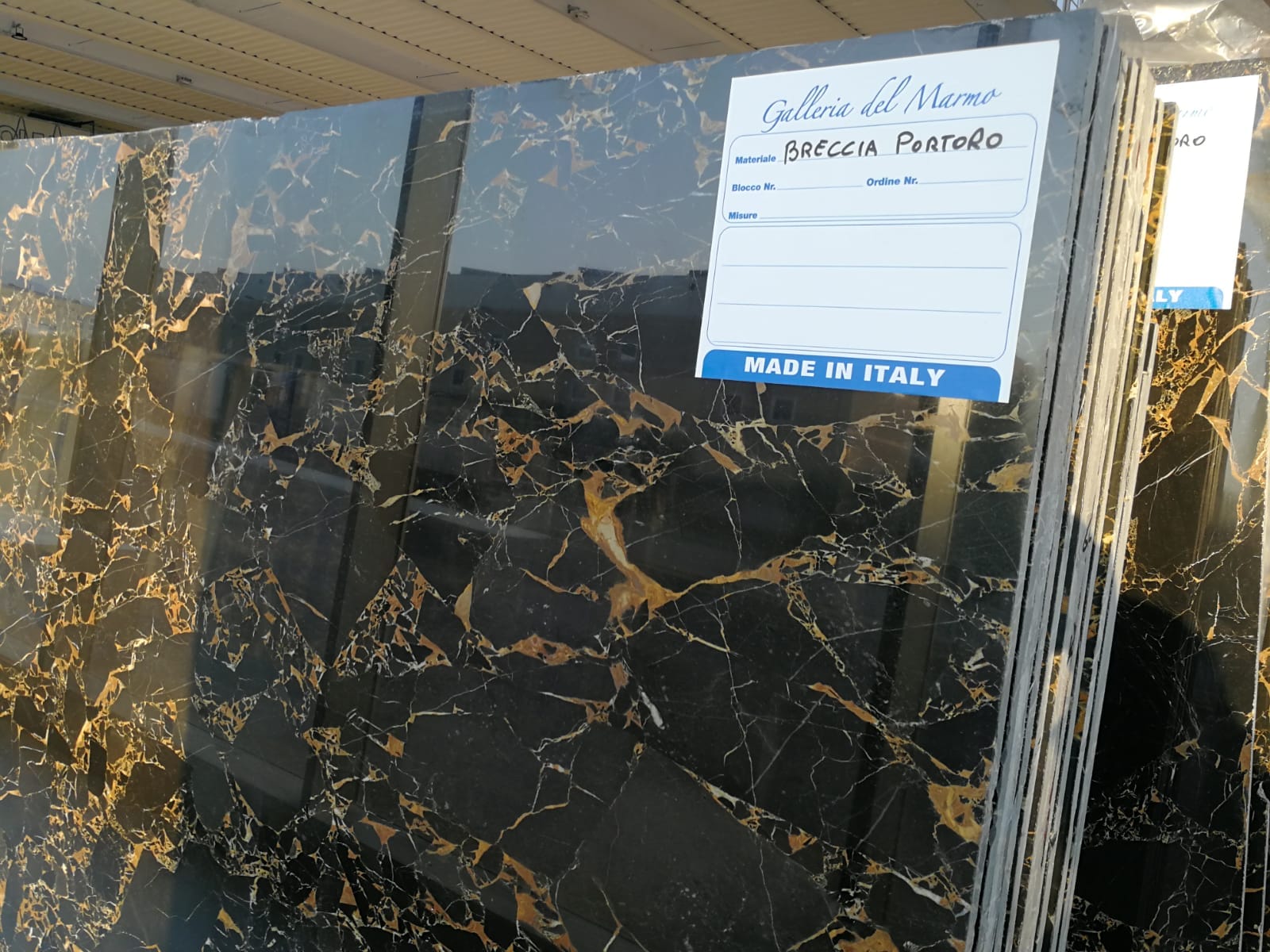 tranche breccia portoro